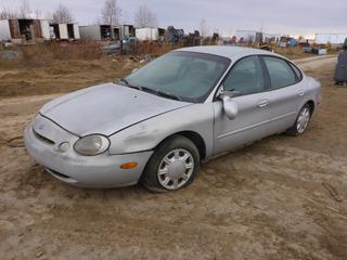 1996 Ford Taurus GL 4-Door Sedan C/w 3.0L, V6, A/T. Showing 1FALP52U5TG149933 *Note: Damaged, Running Condition Unknown* **Located Offsite at 21220-107 Avenue NW, Edmonton, For More Information Contact Richard at 780-222-8309**