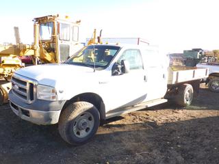 2006 Ford F350 XLT 4X4 Crew Cab Flat Deck Truck C/w Triton V10 Gas, Aluminum Deck, A/T And 275/70 R18 Tires. VIN 1FDSW35Y46EB59473 *Note: Running Condition Unknown* **Located Offsite at 21220-107 Avenue NW, Edmonton, For More Information Contact Richard at 780-222-8309**