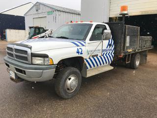 1998 Dodge Ram 3500 Flat Deck Truck 2WD, Single Cab, Cummins Turbo Diesel, Showing 54,284km, VIN: 3B6MC36D4WM224645 *NOTE: Buyer Responsible For Loadout, Identifying Decals Will Be Removed By Consignor Before Item Loadout* **LOCATED OFFSITE @ Fort McMurray Airport, 547 Snow Eagle Drive, Fort McMurray, AB Call Chris For Info @ 587-340-9961**