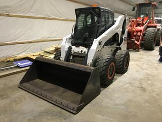 2007 Bobcat S250 Skid Steer C/w A/C Cab, Aux Hyd. Approx. 60in Bucket. Showing 8,753hrs, S/N 530915746 *Note: Buyer Responsible For Loadout* **LOCATED OFFSITE @ Fort McMurray Airport, 547 Snow Eagle Drive, Fort McMurray, AB Call Chris For Info @ 587-340-9961**
