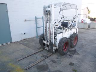 1971 Bobcat, Model M600, Forklift, Engine 25 HP, 4 Ft. Forks, 1,000 lbs. Capacity, SN 71771, *Note: Unverified Hours*