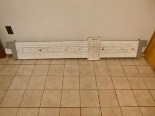 Hughes Owens Co. Versatrig Slide Ruler, Approx 80in. Long
