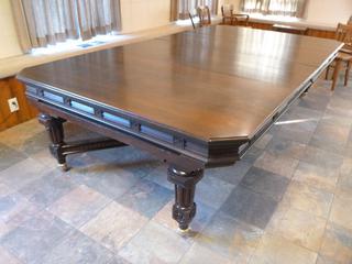 Large Solid Wood Table On Casters, W/ (2) Leaf Inserts, Approx 120in. X 66in. X 30in., Comes Apart In 3 Pieces (As Per Consignor) *Note: Item Located Upstairs, Buyer Responsible For Dismantle/Loadout*