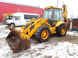 1995 JCB 214S Series 2 4X4 Loader Backhoe c/w Perkins Diesel, 92 HP, Powershift, Aux-Hyd, Cab, A/C, 90 In. Bucket, 23 In. Digging Bucket, Extend-A-Hoe, (2) Outriggers, 4-In-1 Bucket, 16.9-24 Tires, Showing 2,203 Hrs, SN SLP214FCSE0435512  **Located Offsite Near Clyde, AB, For More Information Contact Chris 587-340-9961**