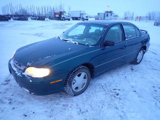 2000 Chevrolet Malibu Sedan c/w 3.1L, A/T, A/C, 215/60R15 Tires, Showing 250,777 Kms, VIN 1G1ND52J9Y6190833 *Note: Front Passenger Window Missing, Crack In Front Bumper, Tire Pressure and ABS Light On, Windshield Damaged* (PL#0064)