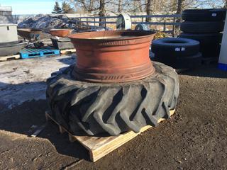 (1) Tractor Tire 18.4 - 38 w/ Rim and (1) Rim.