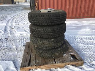 (4) Unused Trailer Tires ST 235/80 R16 124/120M w/ 8 Bolt Pattern Rims.