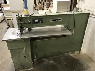 Selling Off-Site - Kuper Veneer Stitcher, Veneer Thickness 0.4-2mm, Width of The Passage Under The Body 1150mm, Foot Pedal Control, Table Top Dimensions: 1490x640mm, 2 Metal Pressure Rollers, Air Demand: 6 bar, Rubber Pulling Roller, 2 Toothed Pulling Rollers, 0.55kW Engine, Dimensions: Length: 2100mm Width: 730mm Height: 1870mm, Weight 492 kg.  Call Graham Cook 403-968-7697 For Viewing & Load Out.

