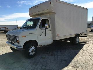 1989 Ford Econoline Van c/w 5.8L V8, Auto, 14 Ft. Box, Showing 221,012 Kms, VIN 1FDKE30H1KHC13296. *Note: Not Running, Started For a Short Time, Driver Seat Ripped, Driver Door Missing Arm Rest, No Hood Holder, Rear Door Problem, Door Stuck Open Inside Van. Out of Province B.C., No Registration Available.