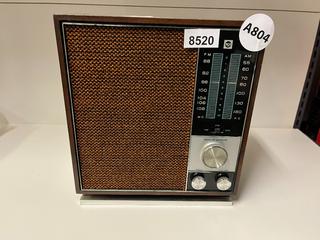 RCA Model RLC40W Walnut AM/FM Radio.