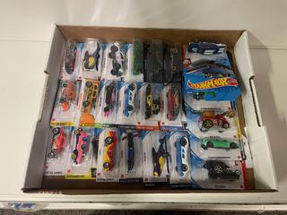 Assorted Hot Wheels.