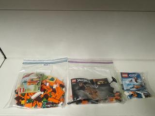 Lego Ninjago, Lego City Snowmobile, and Lego Carrot House Set.