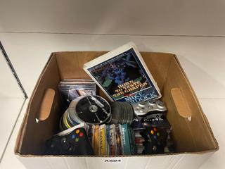 Assorted CD's, Cassette Tape Set, X-Box Controllers and DVD.