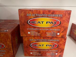 (2) Boxes of Heat Pax Air Activated Warmers.