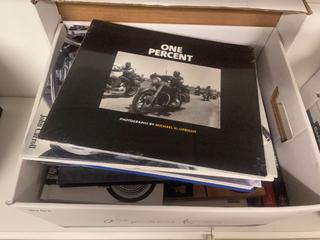 Box of Motorcycle Books.