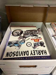 Box of Motorcycle Books.