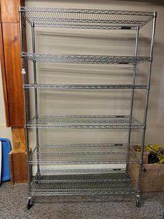 6-Tier Rolling Chrome Rack, 47in x 18in x 76in.