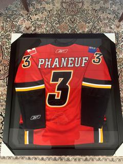 Framed Signed Dion Phaneuf Calgary Flames Jersey.