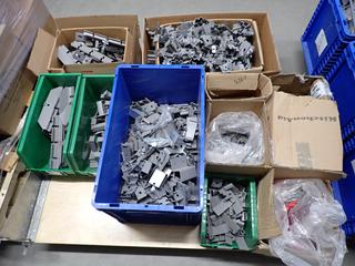 Assorted Metal Brackets with Clamp Nuts.