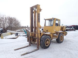 1985 Patrick AR5 4x4 Rough Terrain Forklift c/w Ford Diesel Engine, Model 27225, Power Shift Transmission, Single Stage Mast, 4 Ft. Forks, 365/80R20 Tires, 10,000 Lb. Capacity, Showing 5,138 Hrs **For More Information Contact Richard 780-222-8309**