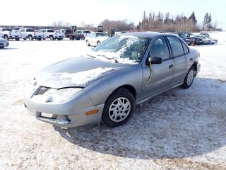 2005 Pontiac Sunfire SLX Sedan c/w 2.2L, Manual, 195/70R14 Tires, Showing 301,307 Kms, VIN 3G2JB52F65S154536 *Note: Starts With Boost, Engine Light On, Gas Gauge Does Not Work, Dent In Trunk, Rust*
