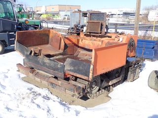 12 Ft. Paver c/w 4-Cylinder Diesel Hydraulic Drive, Hydrostatic Transmission, 12 In. Rubber Tracks, Showing 0101 Hrs *Note: Motor Seized* **Located Offsite at 21220-107 Avenue NW, Edmonton, For More Information Contact Richard at 780-222-8309**