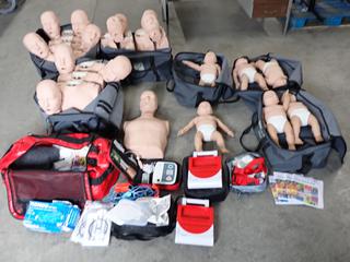 (12) Adult CPR Dummies, (12) Infant CPR Dummies, (3) Practice AED Machines, Blankets, Etc.