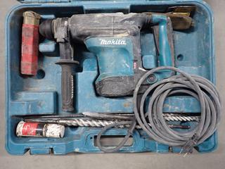 Makita HR3210C Hammer Drill with Extra Bits, 120V, 8.2A, 60Hz.