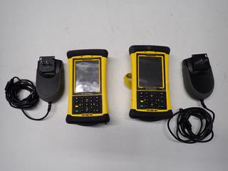 (2) Trimble Nomand 900 6GB Handheld Data Collectors with AC Adapter.