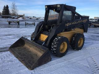 1999 New Holland LX885 Turbo Skid Steer c/w 74in Bucket, Showing 3007 Hrs. S/N 117272.