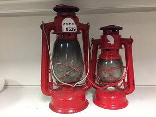 (2) Red Oil Lanterns.