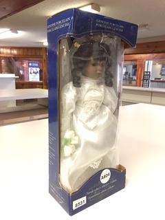 Handcrafted Collectors Edition Genuine Porcelain Doll.