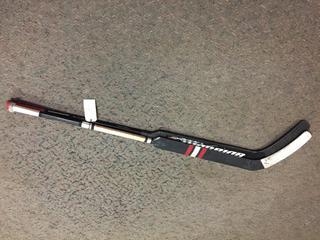 (2) Goalie Sticks.