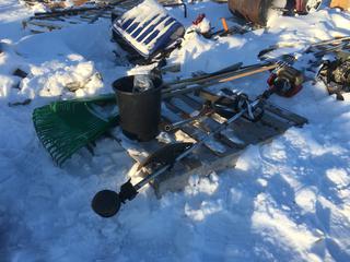 Shindaiwa 242 Trimmer *Requires Repair* w/ Edger Attachment, Backpack Harness, (3) Rakes and (3) Leaf Rakes.