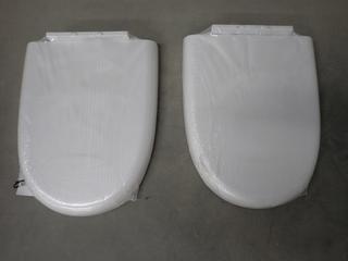 (2) White Oblong Toilet Seats. (8-K-2)