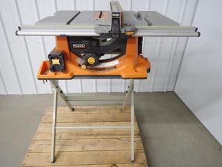 Ridgid Model R45101 10in Table Saw c/w Makita Stand.  (WH)