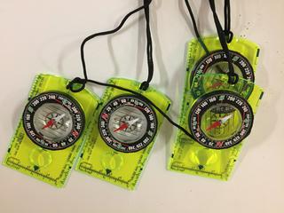 (4) Yellow Plastic Compasses w/ Magnifing Sight.