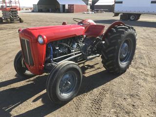 Massey Ferguson FE-35 Tractor c/w 4 Cyl Diesel, Power Shift Trans, PTO, 3 Point Hitch, 6.50-16 Front, 14.9-24 Rear Tires, Showing 11097 Hours, S/N SDM133244, *Front Damaged, Water Temp Gauge Damaged*