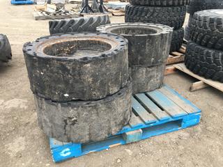 (4) Solid Rubber Loader Tires 36 x 12-20/8.00 w/ Rims.