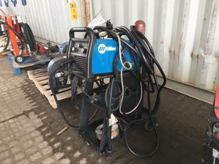 Millermatic 211 Welder c/w Acetylene Bottle and (1) Roll of Oxypro Copper Coated Mig Welding Wire.