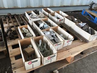 Quantity of Grain Trailer Parts and Unused Holland Landing Gear Parts.