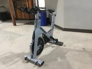 Star Trac NXT 7090 Spin Bike w/ Adjustable Seat, Dual Sided Pedals, Extra Durable Crank System and Push Brake Safety System, S/N SBEN1301-L01651. (AUD)