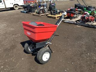 Earthway Fertilizer/Seed Spreader and Hose Reel.