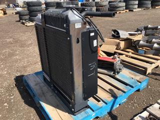 Cat/Perkins Stationary Charge Air Cooler and Toro Rotary Mower Head.