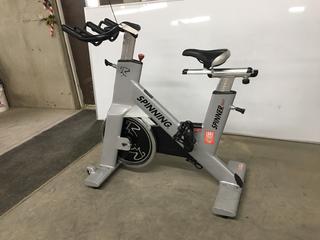 Star Trac NXT 7090 Spin Bike with Adjustable Seat, Dual Sided Pedals, Extra Durable Crank System, Push Brake Safety System, S/N SBEX0812-T13670.  (SC)