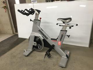 Star Trac NXT 7090 Spin Bike with Adjustable Seat, Dual Sided Pedals, Extra Durable Crank System, Push Brake Safety System, S/N SBEX0812-T13739.  (SC)