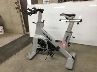 Star Trac NXT 7090 Spin Bike with Adjustable Seat, Dual Sided Pedals, Extra Durable Crank System, Push Brake Safety System, S/N SBEX0901-T15314.  (SC)