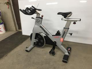 Star Trac NXT 7090 Spin Bike with Adjustable Seat, Dual Sided Pedals, Extra Durable Crank System, Push Brake Safety System, S/N SBEN1301-L01736.  (SC)