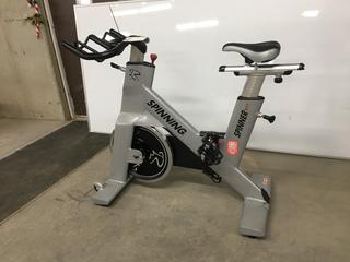 Star Trac NXT 7090 Spin Bike with Adjustable Seat, Dual Sided Pedals, Extra Durable Crank System, Push Brake Safety System, S/N SBEX0902-C02473.  (SC)