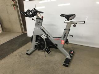 Star Trac NXT 7090 Spin Bike with Adjustable Seat, Dual Sided Pedals, Extra Durable Crank System, Push Brake Safety System, S/N SBEN1301-L01628.  (SC)